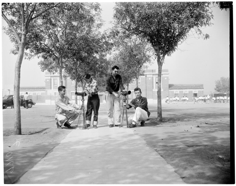 Students taking pictures in the quad of Hamilton high school in 1952 
