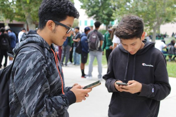 AMPA senior Justin Castaneda and junior Rudy Monzon expand their gaming skills during nutrition.
