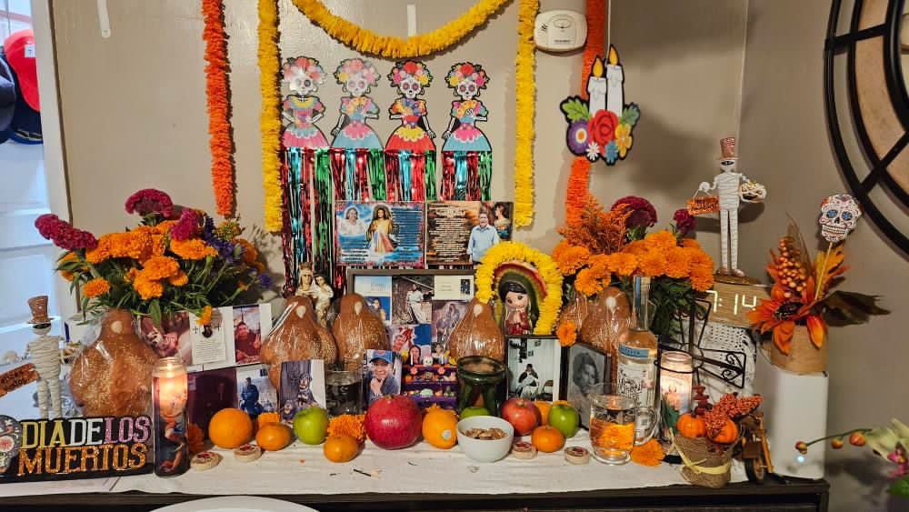 Homemade ofrenda in remembrance of passed loved ones in a home.
