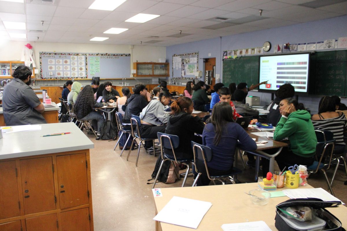 Students fill Mr. James chemistry classroom.