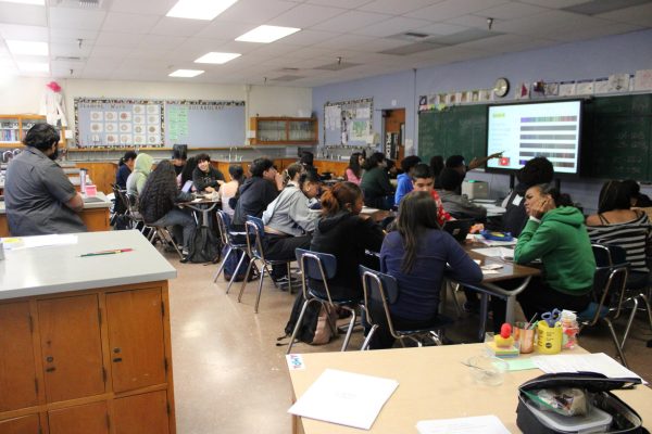 Students fill Mr. James chemistry classroom.