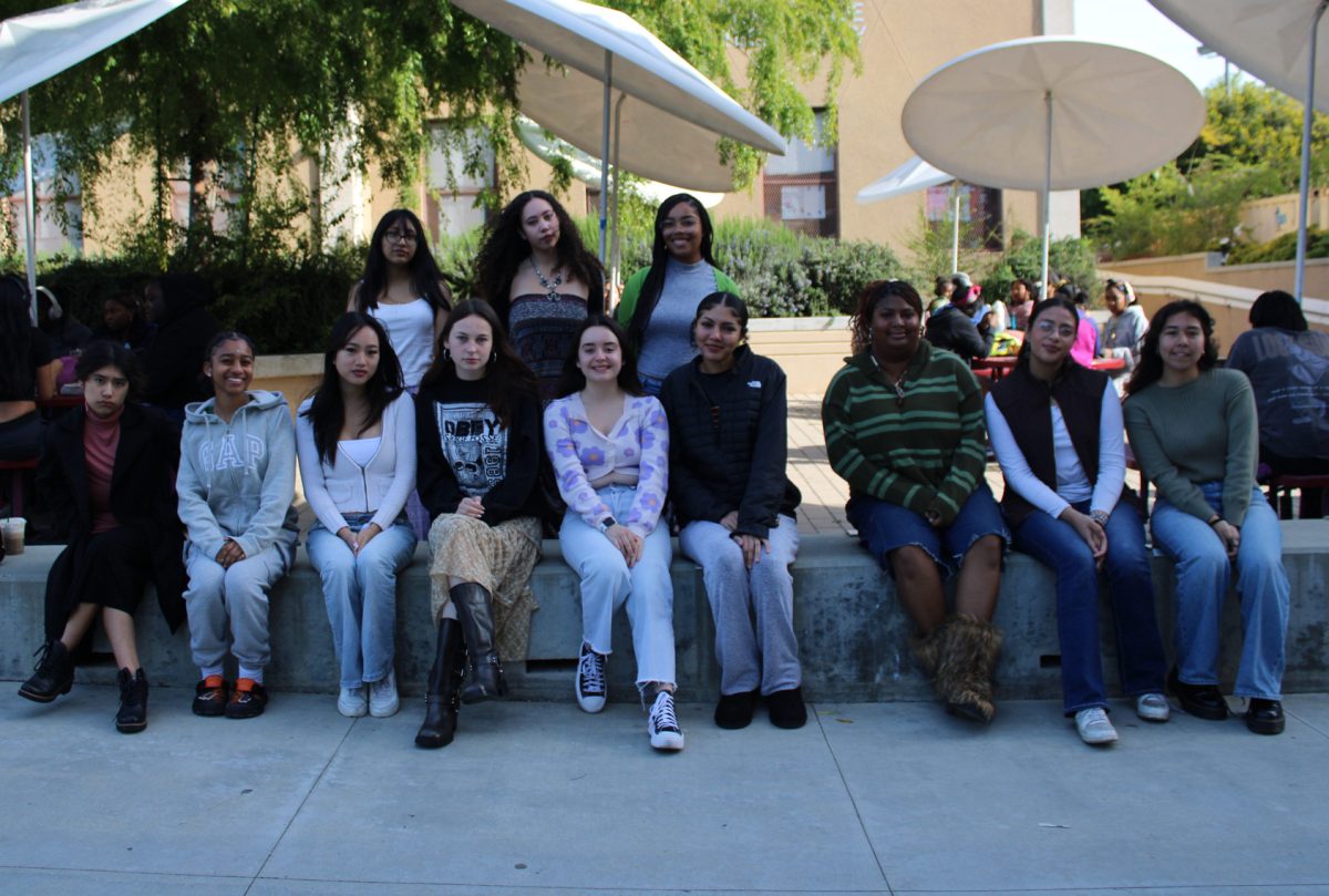 Highlighted students featured in group photo.