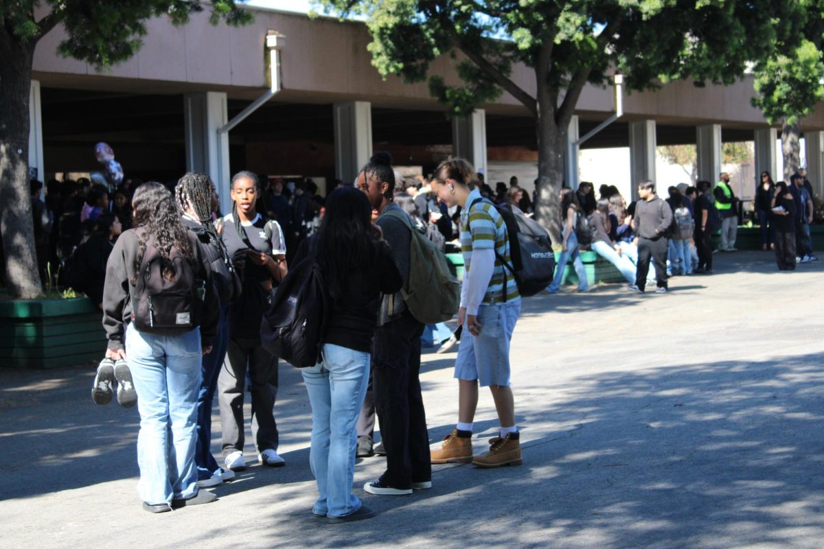 Students gather in the quad at lunch. Many students said they would never want to homeschool because they like to see their friends every day.