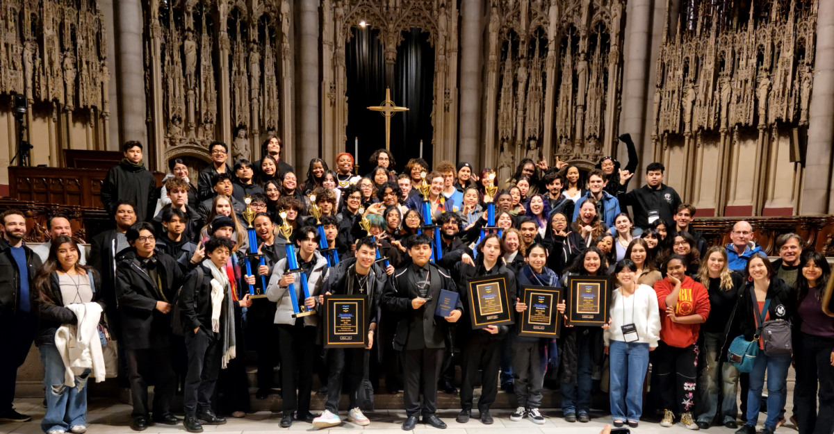 AMPA performs pose with their awards at Riverside Church.