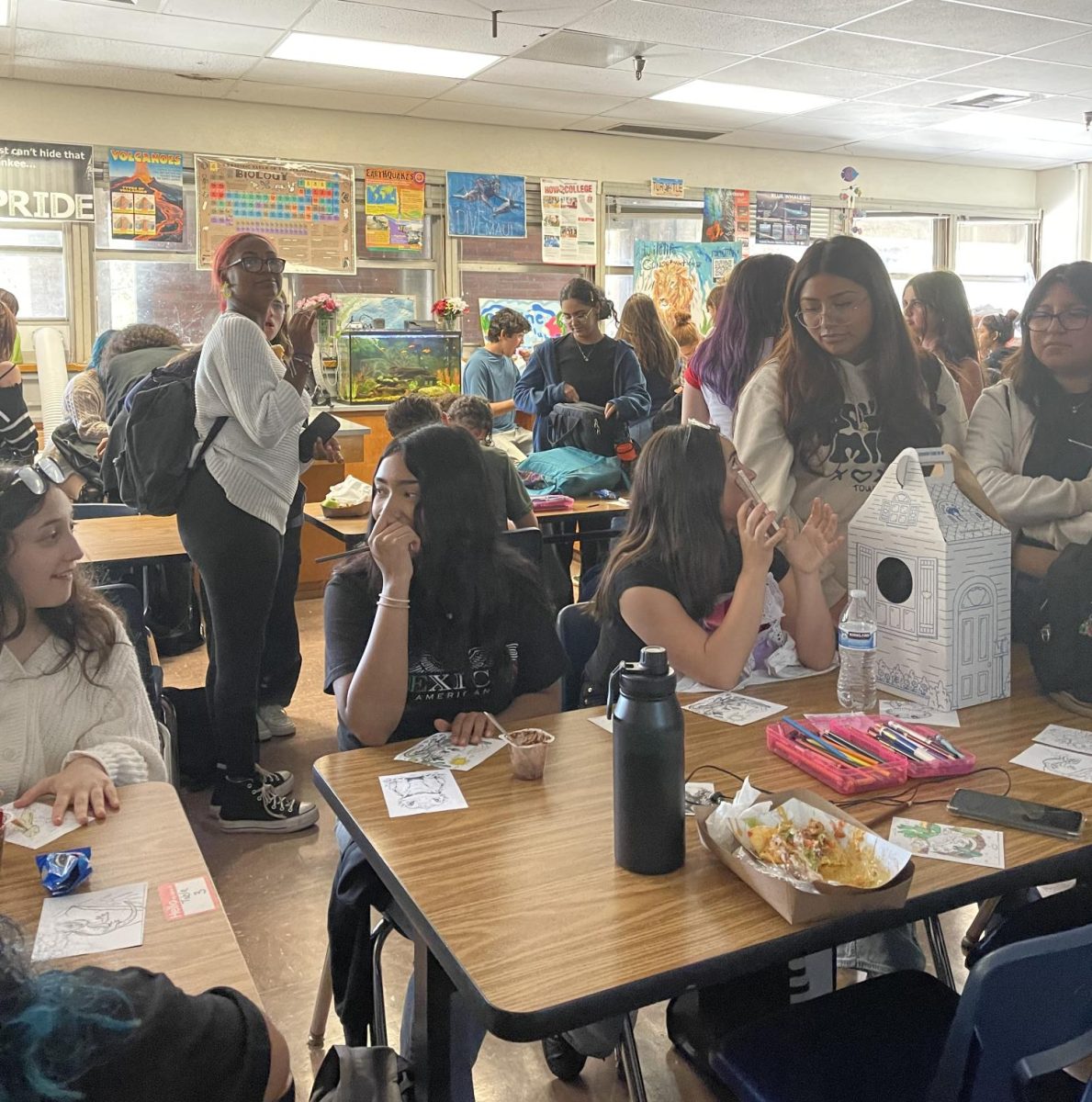 Students gather to remember Ms. Kleinmaier's class pet, the bearded dragon Cocoa.