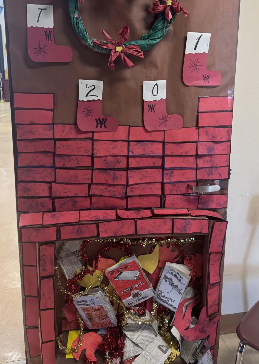 Mr. Macias' door submission includes banned books being burned in a fireplace.