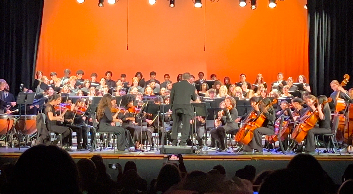 Mr. McDonough conducts the Hamilton Chamber Orchestra with singers from the choir.