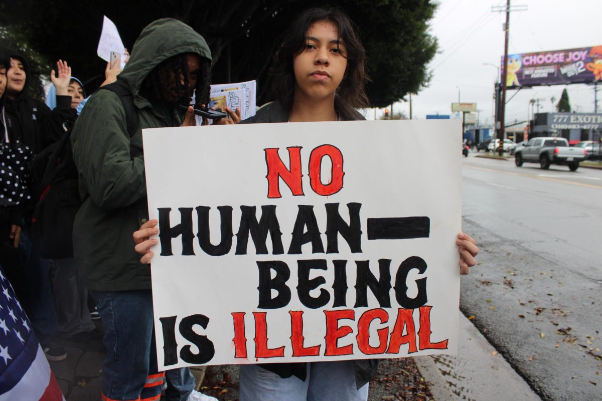 A student participates in the protest.