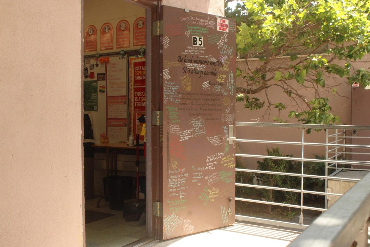 The door of B5 holds memories of a teacher, Mrs. Hagerman, who passed away. "Students and faculty signed the door and left messages and heartwarming notes for her after her passing," said the room's current teacher, Ms. Burns.