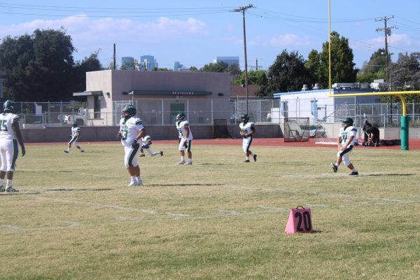 On September 25, the football team practices on the football field, preparing for their upcoming game.