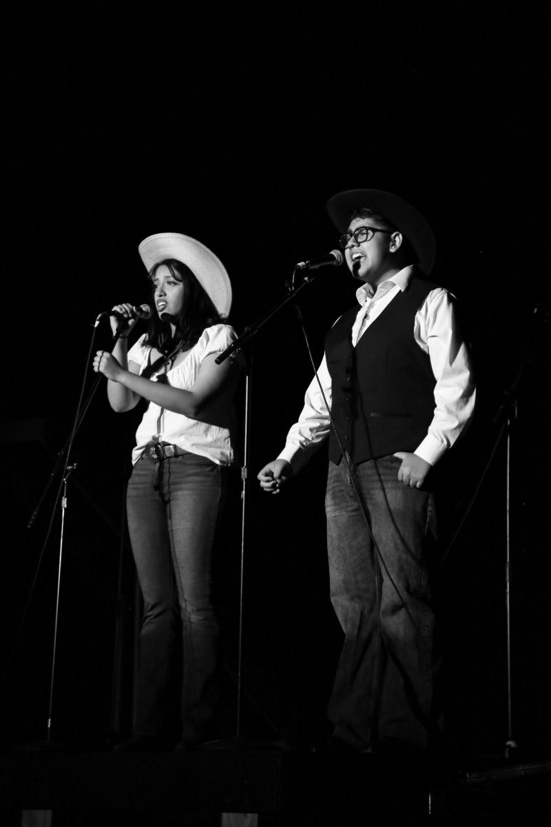 AMPA juniors Matthew Garcia and Mayra Gonzales perform a duet of the song ____. 